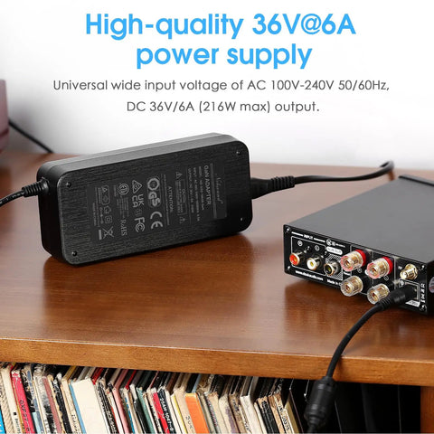 36V 6A Power Supply GaN Adapter delivers 216W high efficiency for amplifiers and active speakers on wooden shelf