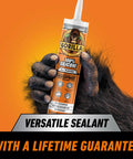 Gorilla 100% silicone sealant cartridge, all-purpose, 10 oz, clear with orange label, held by a gorilla hand