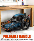 22 Inch Gas Walk Behind Brush Cutter with 160cc 4 Cycle Engine folded under workbench for compact storage