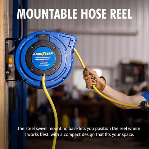 Professional Grade Retractable Air Hose Reel Featuring 3/8 Inch By 50 Foot Hybrid Polymer Tubing With 300 Psi Pressure Capacity and Kickass Swivel Joint For Daily Shop Duties mounted on a wall with a yellow hose being pulled.