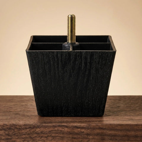 Single Adjustable Square Furniture Foot With Threaded Foot Pad on wood surface, part of 8 Pack, Plastic and Metal Leveling Glides.