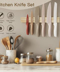 Workhorse 13 Piece Kitchen Knife Set With Anti Rust Coating Keeps Blades Sharp Dishwasher Safe Stainless Steel on wall rack.
