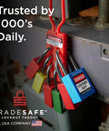 Several lockout tagout padlocks securing machinery, showcasing Tradesafe LOTO safety locks with various colors and danger tags.