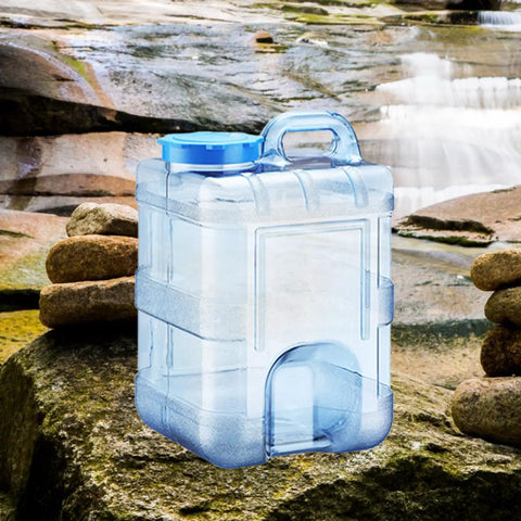15 Liter Camping Water Container With Lid For Outdoor Use, Food Grade PC Water Jug on rocks by stream