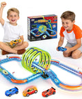 Kids playing with Slot Car Race Track Set With Glow In The Dark Tracks, 71 Pieces, USB Rechargeable Light Up Car, 360 Degree Triple Loops