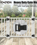 Heavy Duty Dump Trailer Gate Hinges With Grease Zerk, Weldable Trailer Door Hinge Featuring Bulletproof Short Leaf Strap Build, Raw Finished Steel, Straight Up Job Ready Hardware, Four Pack mounted on a white gate.