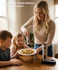 Xinkor Electric Salt And Pepper Grinder Set With Usb Rechargeable Charging Base used by a woman for seasoning pasta at the dining table.