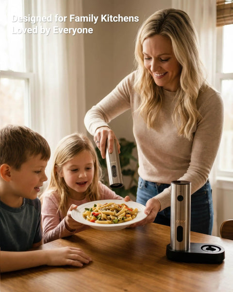 Xinkor Electric Salt And Pepper Grinder Set With Usb Rechargeable Charging Base used by a woman for seasoning pasta at the dining table.