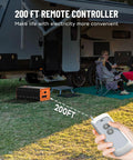 A person using a remote control to operate a 3000W Power Inverter 12V DC To 110V AC Converter with LCD Display near an RV campsite.
