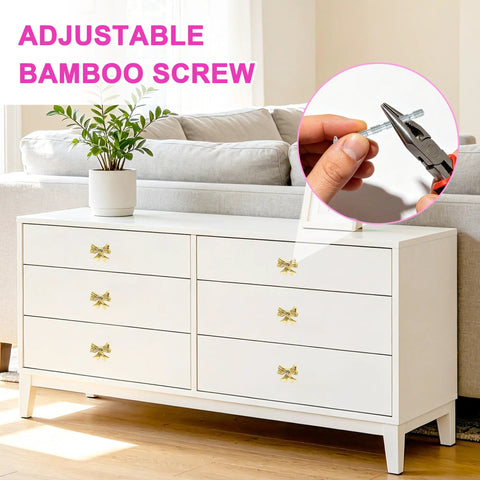 White dresser with 8 Pack Gold Bow Dresser Knobs Set For Cabinets And Drawers, close-up of adjustable bamboo screw.