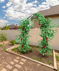 Metal Garden Arch Trellis For Climbing Plants Outdoor 8.2 Ft Tall Arbor With Planter Boxes in sunny backyard garden setting