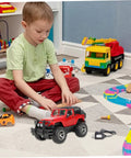 Child playing with RC cars on carpet with USB RC Battery Charger For 4.8V RC Cars With Indicator Light, toys in the background