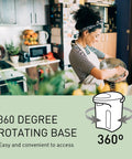 Person in a kitchen making food next to a 360 degree rotating hot water dispenser, highlighting convenience in home settings.