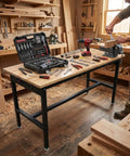 Badass 70 Inch Adjustable Workbench Featuring Rock Solid 2500 Pound Steel Frame And Built In Rolling Cabinet Storage, tools visible.