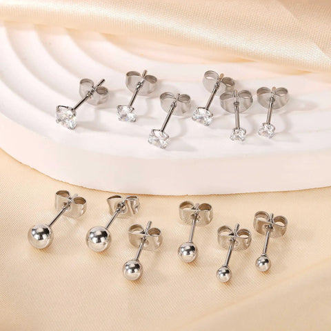 Stainless Steel Earring Set For Women, 10 Pairs, Includes Small Huggie Hoops, CZ Studs, And Glossy Spherical Studs, Versatile Stainless Steel Jewelry For Everyday Piercing Looks. Front view of 316L steel CZ and ball stud earrings