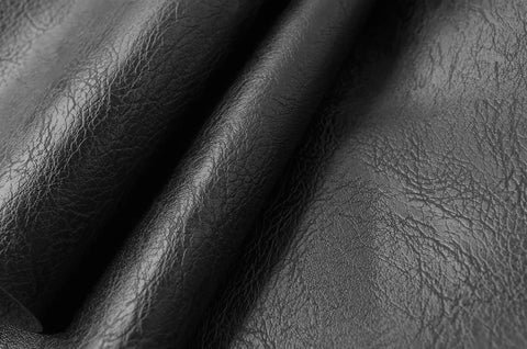 Close-up of Thick Faux Leather PU Fabric With Soft Skin Grain For Furniture Covers And Reupholstery For Sofas Chairs And Cushions Vinyl Upholstery