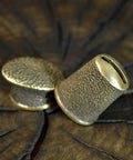 Finger Guard Bolster And Pommel Knife Making Set Hand Cast Bronze Dirk 1 close-up on wooden surface
