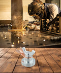 Super Magnetic Welding Ground Clamp Makes Fast Setup Easy As Pie For Iron Work Instant Grip On Smooth Metal Surfaces shown in use with sparks.
