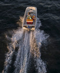 Boat on water with Portable 12 Gallon Marine Gas Can With Built In Fuel Gauge And Pick Up Cap 2 Way Vented Cap Easy To Carry Handles EPA And CARB