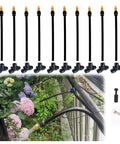 10 Pack Brass Misting Nozzles Tee 8 Inch 360 Degree Adjustable Copper Sprayer For One Quarter Inch Tubing Garden Watering And Drip Irrigation Fittings Easy Clean With Pin Great For Lawn And Plant Care, shown in use in a garden setting.