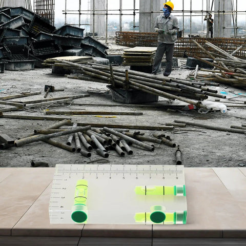 Transparent Bubble Level on a construction site with a ruler, measuring 95x51x13mm, checks horizontal and vertical alignment.