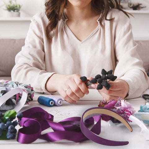One Inch Vegan Leather Headband For Women Non Slip Hair Band Black Game Changer Wrap in craft setting with sewing supplies.