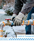 Person applying pipe insulation wrap foam foil tape to outdoor water pipes for freeze protection in snowy weather.