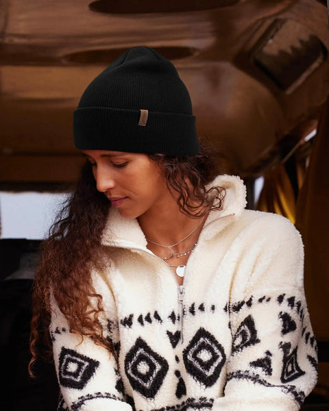 Woman wearing Unisex Cuffed Beanie Thick Double Knit Winter Skull Cap Black Cozy Warm For Skiing Running And Daily Cold Weather Protection Ultra Soft No Itch Comfort