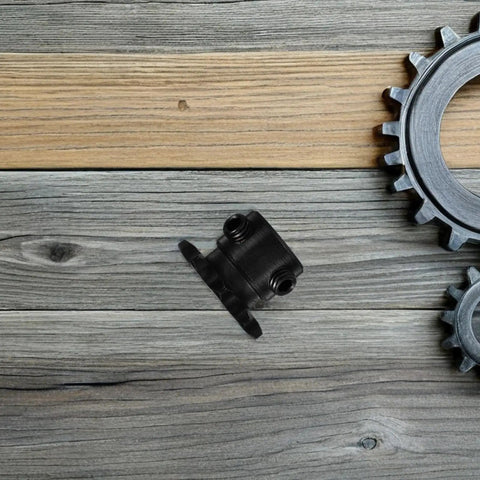 Top Tier 9 Tooth Carbon Steel Roller Sprocket For Heavy Duty Drive Systems That Cut Noise And Vibration While Churning Out Insane Power Transmission Stats, featuring a close-up view on wooden surface.