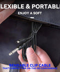 Hands holding Universal DC Power Cord For Tattoo Machines With Pen Rotary Systems, black cable showing durable connectors.