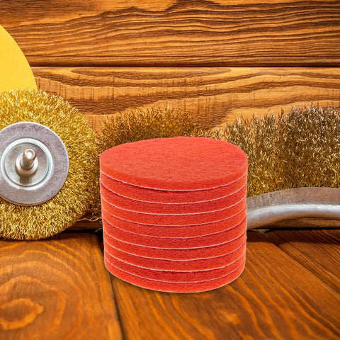 10 Pcs Orange Nylon Hook And Loop Electric Sanding Discs 2000 Grit stacked on wooden surface with tools for buffing.