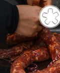 Person using Bulk 4000 Piece Aluminum U Shaped Sausage Casing Clips And Nail Clippers For Rapid Batch Production Fast Changeover Tools on sausages.