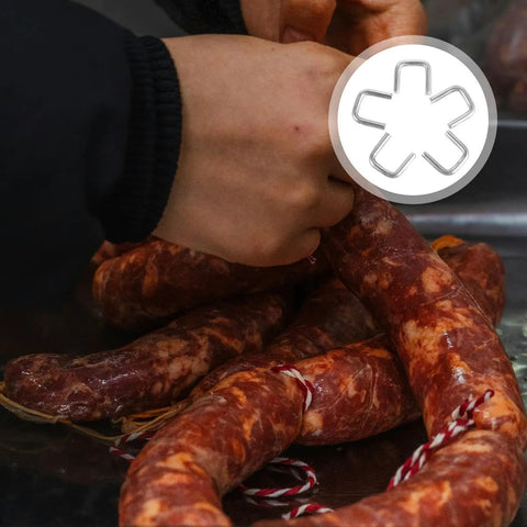 Person using Bulk 4000 Piece Aluminum U Shaped Sausage Casing Clips And Nail Clippers For Rapid Batch Production Fast Changeover Tools on sausages.