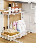 Super Sturdy Two Tier Under Sink Organizer With Adjustable C Shape Base And Smooth Pull Out Rollers, featuring slide out shelves holding cleaning supplies.