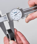 Dial Caliper With 0-6 Inch Range, Precision To 0.001 Inch, Measures Inside, Outside, Depth And Step, Knurled Lock in use