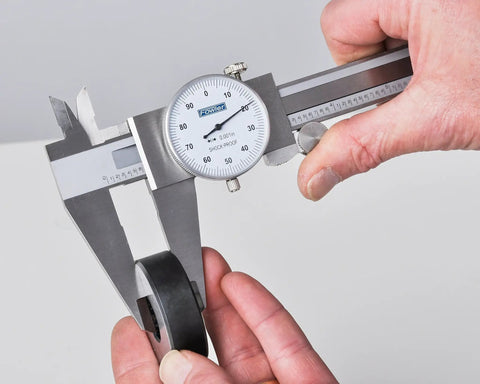 Dial Caliper With 0-6 Inch Range, Precision To 0.001 Inch, Measures Inside, Outside, Depth And Step, Knurled Lock in use