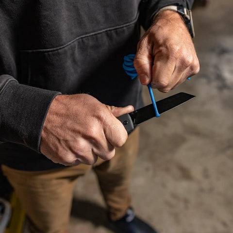 Man using Pledge Pocket Knife With Pocket Clip 3.7 Inch Full Panel Plain Edge Folding Knife With Stainless Steel Blade Textured Grip