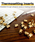 300 Pc M3 Heat Set Brass Inserts With Knurled Body, M3 X D4 X L5 Threaded Inserts for Plastic, on wooden surface with ruler