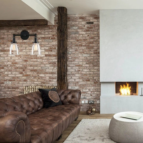 Two Light Swing Direction Wall Sconce With Switch And 5.6 Inch Bell Glass Shade in vintage living room setting.