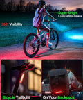 Child on bike with Pink Bike Light Set With Ultra Bright Dual LED Front And Rear Lights, USB Rechargeable, at night