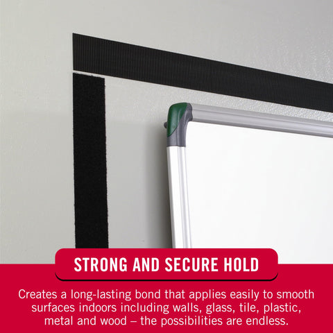 5 Ft White Adhesive Hook And Loop Tape Roll applied to wall beside a whiteboard showcasing strong no sew fasteners for organization