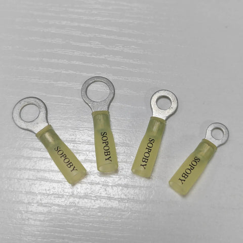 Pro Grade Heat Shrink Wire Connectors Kit With Tinned Red Copper Waterproof Crimp Terminals lying on white surface