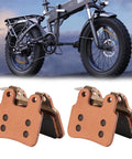 Beefed Up Ceramic E Bike Brake Pads For XD KLBS DOT4 Hydraulic Brakes Front And Rear, shown with e-bike wheel.
