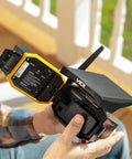 Person holding Solar Powered 4G LTE Outdoor Security Camera for Remote Construction Sites with Included SIM Card Night Vision