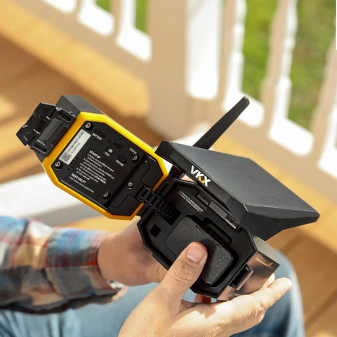 Person holding Solar Powered 4G LTE Outdoor Security Camera for Remote Construction Sites with Included SIM Card Night Vision