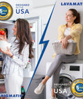 Two In One Voltage And Surge Protector Pack For Fridge And Washer To Stop High And Low Voltage Brownouts And Spikes Keeping Your Appliances Safe And Running Smoothly. Woman in kitchen by fridge and washer with laundry.