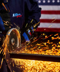 Worker using Heavy Duty Off Wheel for Right Angle Grinders Five-Eighths Inch Arbor A60S to cut metal with sparks flying