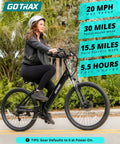 Woman riding 26 Inch Electric Bike With 350W Brushless Motor Up To 20 MPH, 30 Mile Pedal Assist Range, Front Shock, Black