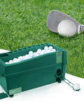 Automatic Golf Ball Dispenser For Practice with club and ball on grass, 24.41 inch ball feed, indoor outdoor swing trainer and club organizer