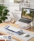 Compact 60 Percent Mechanical Gaming Keyboard Wireless Three Mode Setup, portable and lightweight on desk with laptop and mouse.